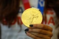Details with a Tokyo 2020 Olympic Games gold medal won by a Romanian female athlete