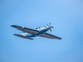 Light aircraft Piper PA-46-600TP (M600), belonging to OK Aviation Group, flying against blue sky