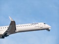 A Lufthansa Mitsubishi CRJ-900LR (D-ACNK) airplane flying against blue sky