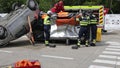Romanian first responders train to extricate and save the victim of a car accident during a drill exercise.