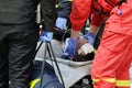 Romanian first responders, firefighters and paramedics, train to extricate and save the victim of a motorcycle accident during a Royalty Free Stock Photo