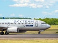 SkyTeam Livery on A Tarom Boeing 737-78J IR-BGF arriving from Amsterdam to Henry Coanda Royalty Free Stock Photo