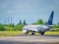 SkyTeam Livery on A Tarom Boeing 737-78J IR-BGF arriving from Amsterdam to Henry Coanda Royalty Free Stock Photo