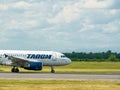 A Tarom Boeing 737-78J YR-BGF airplane on the airport runway at Henri Coanda International Royalty Free Stock Photo