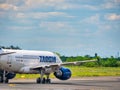 A Tarom Boeing 737-78J YR-BGF airplane on the airport runway at Henri Coanda International Royalty Free Stock Photo