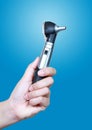 Otoscope in hand