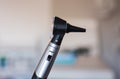 Otoscope used by doctor otolaryngologist to treat malete ears