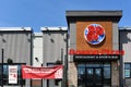 Boston Pizza restaurant with signs offering pickup and delivery during coronavirus lockdown