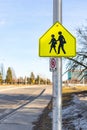 Ottawa, Canada - March 19, 2021: School Ahead sign on the road in Ottawa, Canada Royalty Free Stock Photo