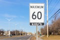 Ottawa, Canada - March 19, 2021: Speed limit road sign, 60 km h maximum Royalty Free Stock Photo