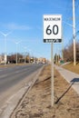 Ottawa, Canada - March 19, 2021: Speed limit road sign, 60 km h maximum Royalty Free Stock Photo