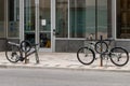 Bikes parked in downtown Ottawa at bicycle rack. Seat and wheel stolen from one bike. Royalty Free Stock Photo