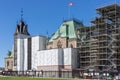 Reconstruction of Parliament of Canada in Ottawa against blue sky. East block