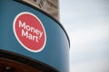 Money Mart logo in front of their boutique in Ottawa, Ontario. Royalty Free Stock Photo