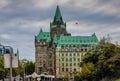 Ottawa government palace. Historical building. Green roof and cloudy sky