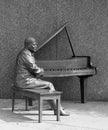 A bronze statue of the Canadian jazz pianist Oscar Peterson, Royalty Free Stock Photo