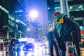 Happy Black Protester Male in the Street at Night Under Rain During Freedom Convoy Protest in Ottawa