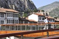 Ottoman houses and people walking on the bridge in Amasya, Black Sea region of Turkey