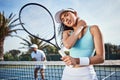 Ouch. an attractive young woman suffering from a neck injury during tennis practice with her teammate. Royalty Free Stock Photo