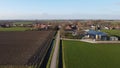 Oude molen a small town in the countryside in the Netherlands where there is a traditional old-fashioned wooden mill. Royalty Free Stock Photo