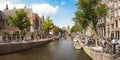 The Oudekennissteeg bridge with the Oude Kerk church, Amsterdam Royalty Free Stock Photo