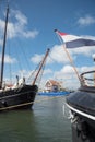 Oudeschild, the Netherlands. August 13, 2021. Details of historic sailing ships in the harbor of Oudeschild, Texel.