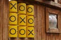 Oughts and crosses, tic tac toe game, at children playground