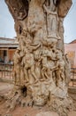 Ouidah, Benin - March 06, 2014: Carved tree trunk in center of town depicting time of slavery