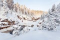 Oulanka National Park. KiutakÃÂ¶ngÃÂ¤s rapids with red rock wall during near Kuusamo in Finnish wild nature.