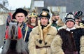 Oung men dressed as viking warriors with horned helmets and animal skins at traditional Pereberia festival