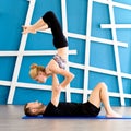 oung people in yoga class in Scorpion Pose. Yoga group concept Royalty Free Stock Photo