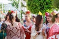 Oung women wearing traditional flamenco dress at the April Fair Seville Royalty Free Stock Photo