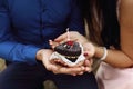 ÃÂ¡ouple holding cake with candle Royalty Free Stock Photo