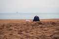 ÃÂ¡ouple of lovers with a dog kissing on the Sant Miguel beach