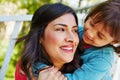 Our bond is unshakeable. a mother receiving a hug from her daughter outside.