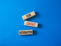 Our contact information symbol. Concept word Our contact information on wooden blocks. Beautiful blue background. Business and Our Royalty Free Stock Photo