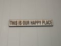 This is our happy place sign