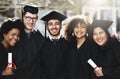 Our hard work paid off today. a group of students standing together on graduation day. Royalty Free Stock Photo