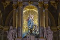 Our Lady's statue on the altar of the Sanctuary of Our Lady of the Guard in the fog, in winter time, in