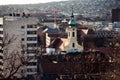 Our Lady of the Snows Parish Church formerly called as the Blood Chapel and Buda cityscape. Budapest, Hungary Royalty Free Stock Photo