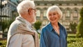 Our love doesn`t change. Beautiful senior couple looking at each other with smile while spending great time together Royalty Free Stock Photo