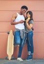 Our love is just cool like that. a happy young couple eating ice lollies together.