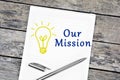 Our mission word on notebook page Royalty Free Stock Photo