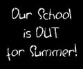 Our School is out for summer white chalk inscription on black background. Quirky handwritten message on blackboard Royalty Free Stock Photo