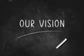 OUR VISION written with chalk on blackboard icon logo design vector illustration Royalty Free Stock Photo