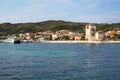 Ouranoupolis town view, harbor, ferry boat and Tower, Athos, Greece