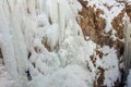 Ouray, Colorado / USA - 26 January 2020: Female ice climber scaling a massive wall of ice Royalty Free Stock Photo