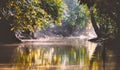 Ourists on a boat cruise along the river of Kinabatangan, some of the most diverse concentration of wildlife in Borneo