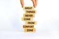 Out from comfort zone symbol. Wooden blocks with words Great things never come from comfort zone. Beautiful white background, copy