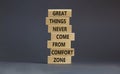 Out from comfort zone symbol. Wooden blocks with words Great things never come from comfort zone. Beautiful grey background, copy